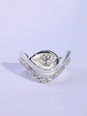 Pear Cut Unique Curved Moissanite Pave Set Engagement Ring Set