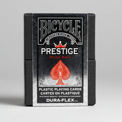 Bicycle Prestige Rider Back playing cards packaging with black and red design.