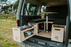 Premium Micro Camper Conversion installed in van boot with pull-out kitchen drawer and storage box
