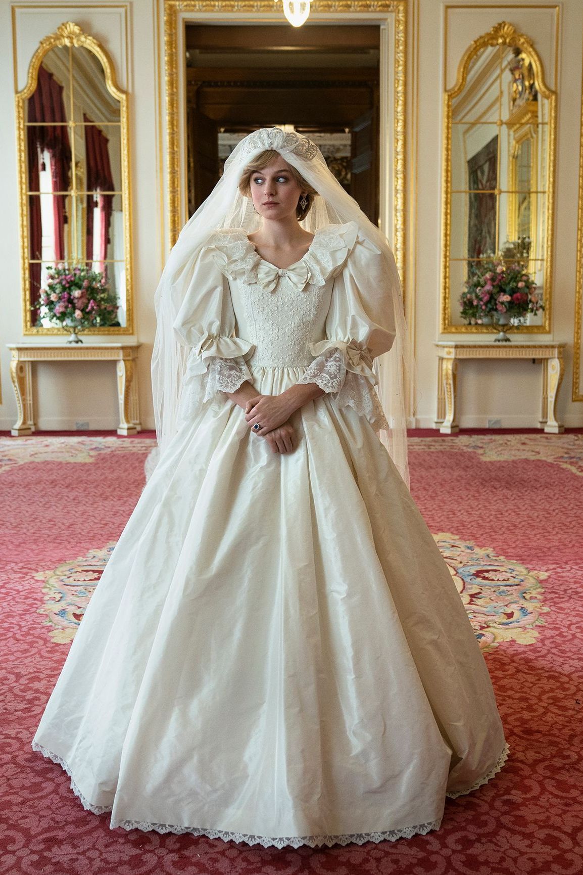 Inside The Emotional Moment Emma Corrin Tried On Princess Diana's Wedding Dress