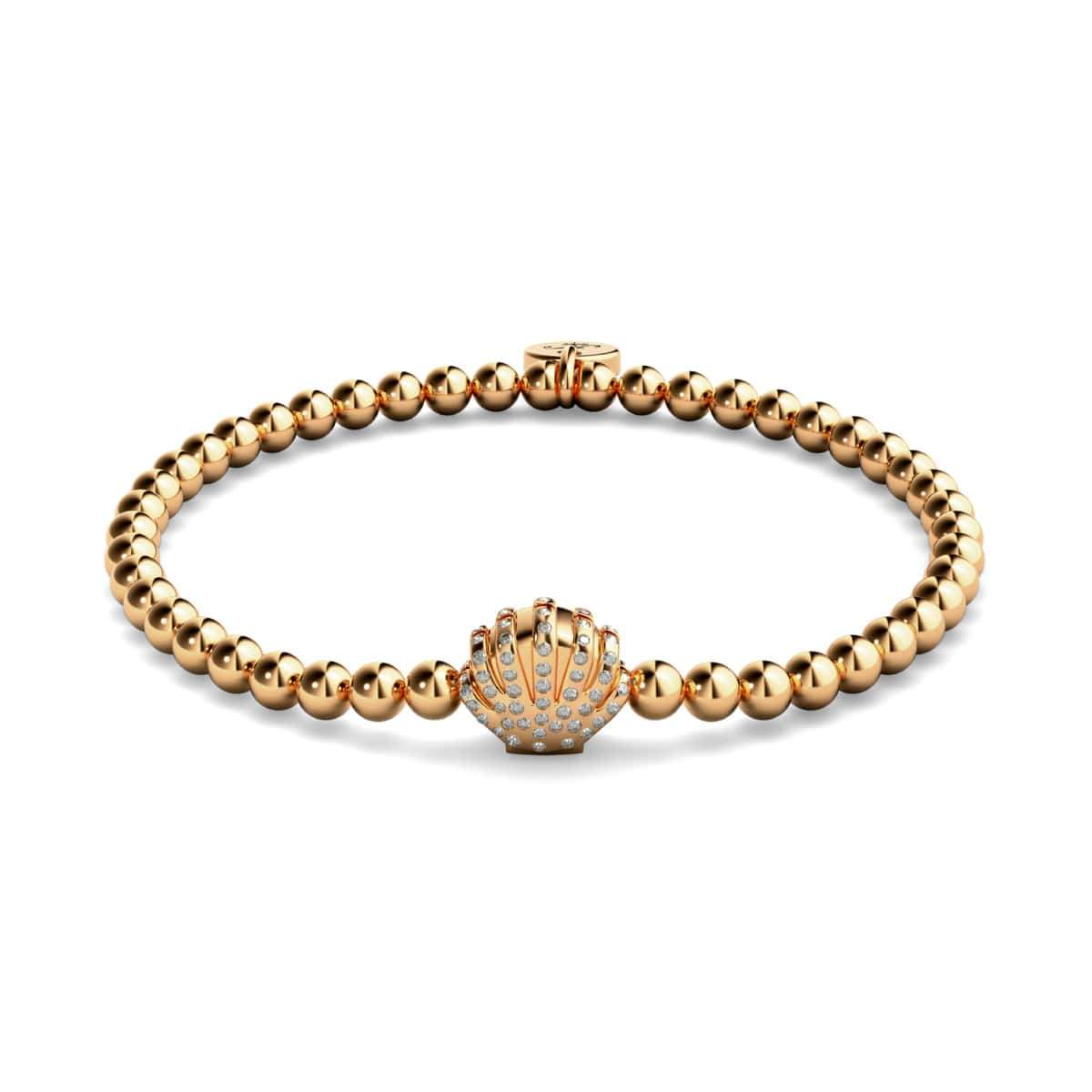 Playa 18k rose gold charm bracelet with crystal-studded sea shell bead and stretch stainless steel base by NOGU