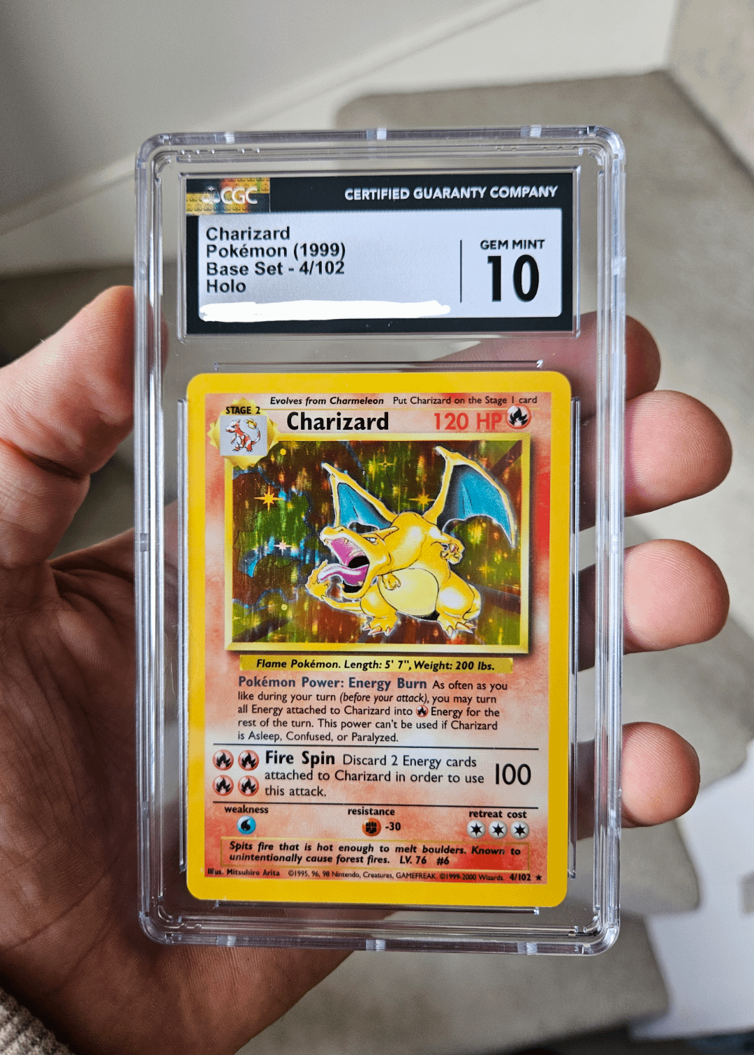 This is my prized possession, one of, if not the rarest Base Set Charizard in the world! : r/PokemonTCG