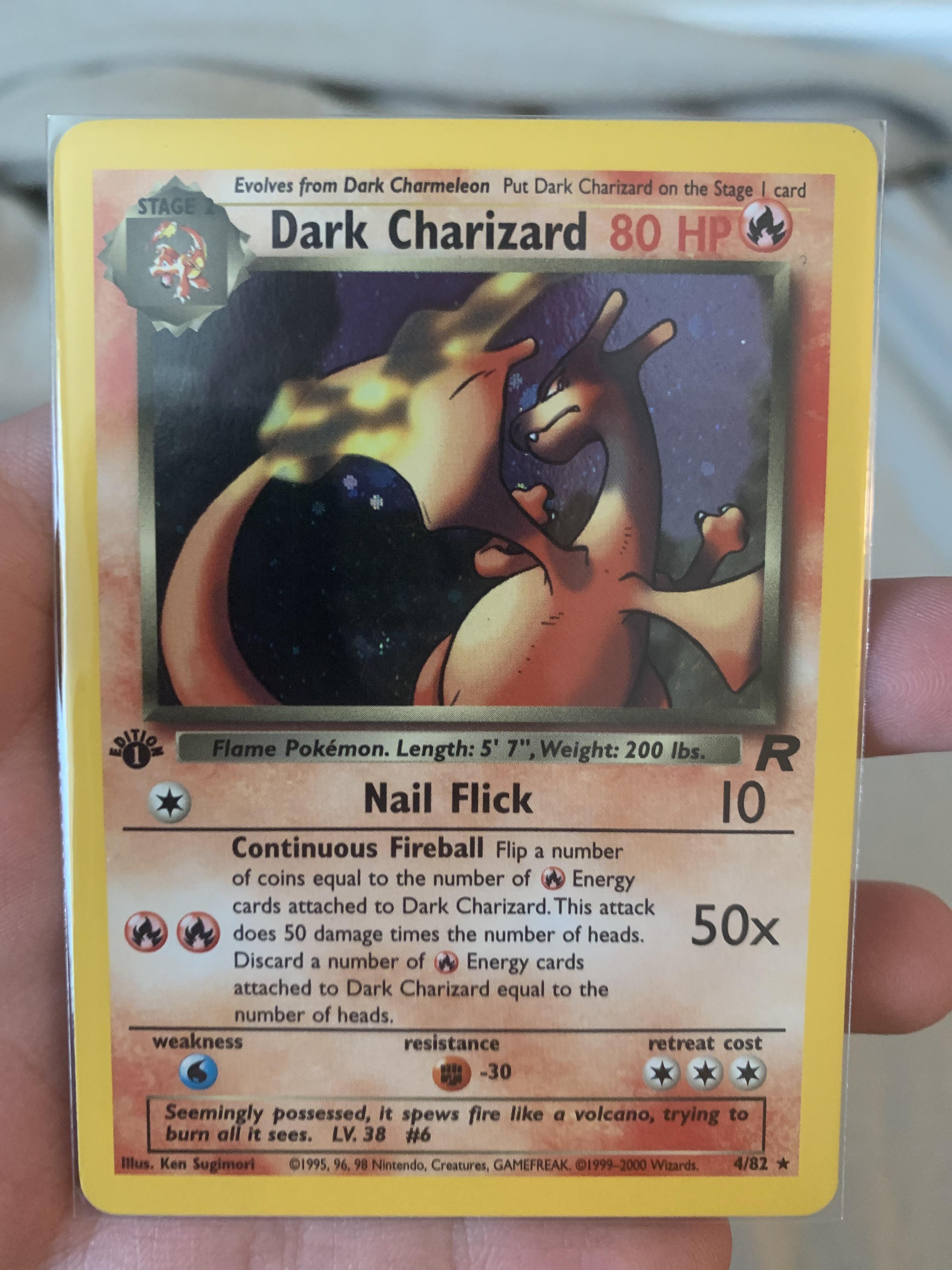 Let's see your most valuable card! Pictured: NM 1st edition Dark Charizard holo from Team Rocket : r/pokemon