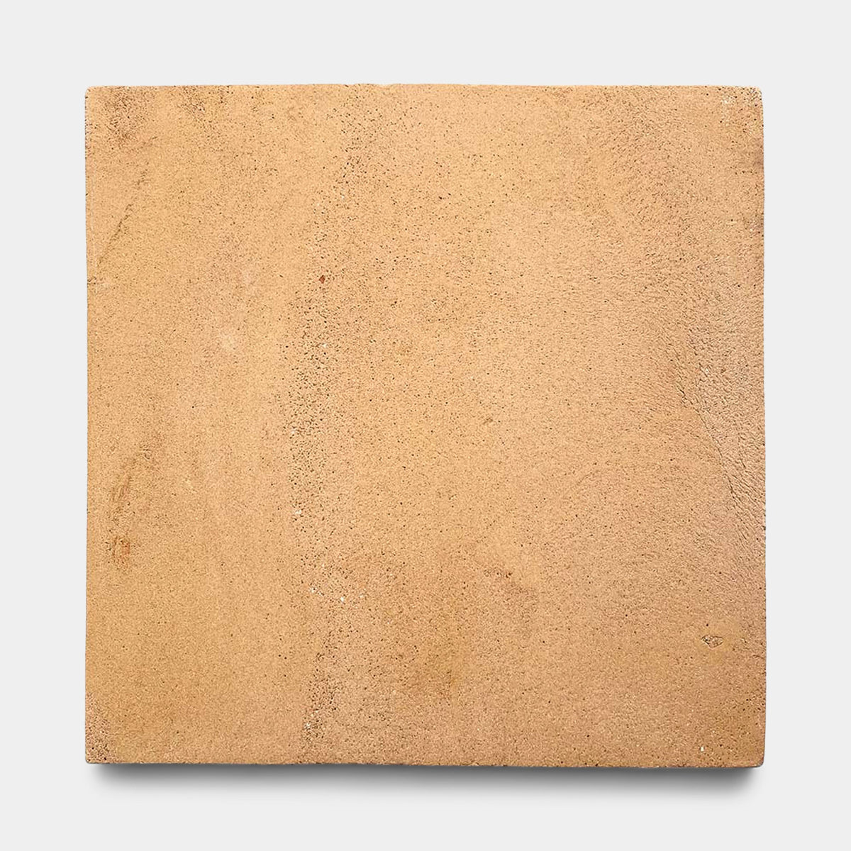 The Zia Tile 13x13 Square + Adobe is a flat, square, light brown sandstone tile with a subtly rough texture and natural variations, inspired by Mexican ceramic art, shown on a plain white background.