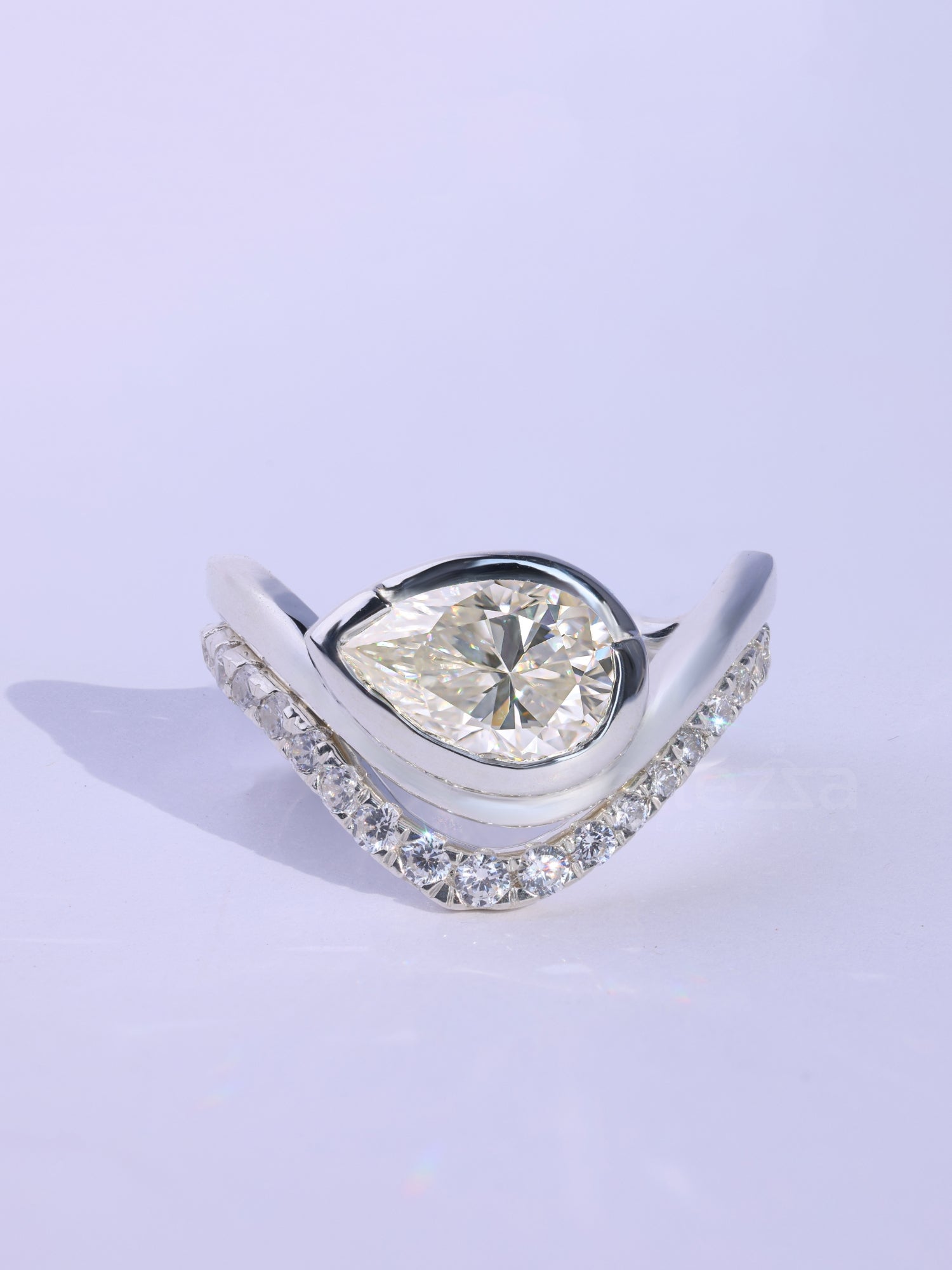 Pear Cut Unique Curved Moissanite Pave Set Engagement Ring Set