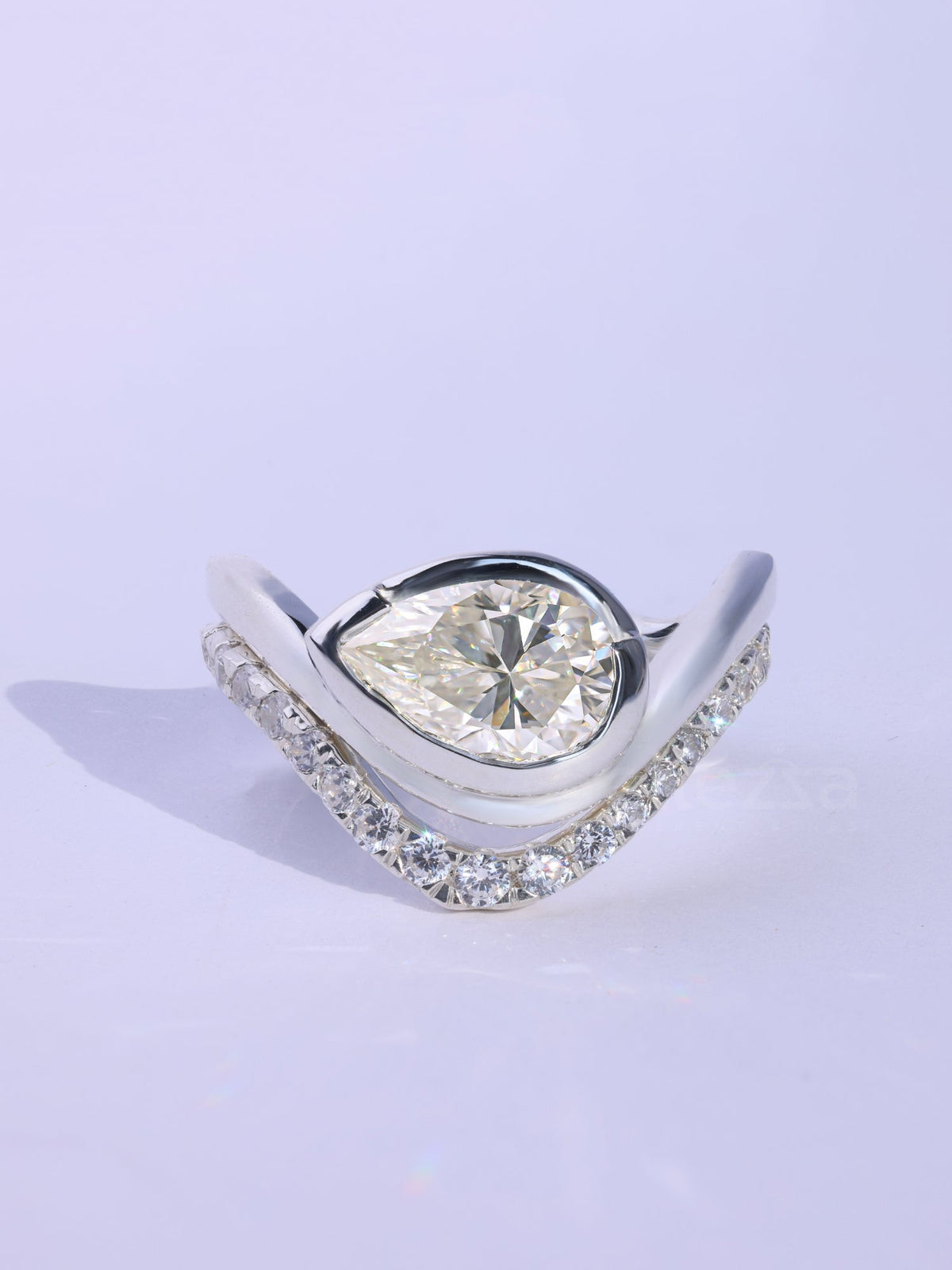 Pear Cut Unique Curved Moissanite Pave Set Engagement Ring Set
