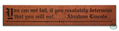 Abraham Lincoln’s quote, “You can not fail if you resolutely determine that you will not.” is now a beautifully carved Wisdom In Wood® inspirational wall art piece