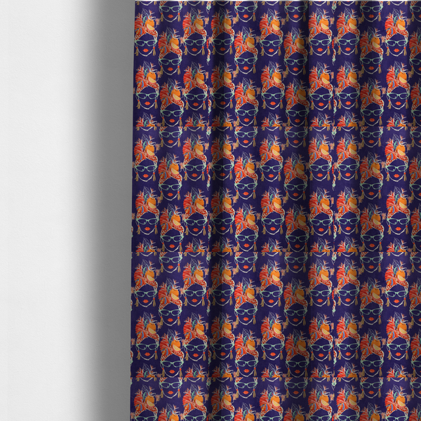 The fabric used to create these made-to-measure curtains is a repeating pattern on dark purple fabric featuring stylized line-art faces of women wearing light green cat-eye sunglasses, bright red lipstick, and elaborate tropical headwraps adorned with orange slices and palm leaves.