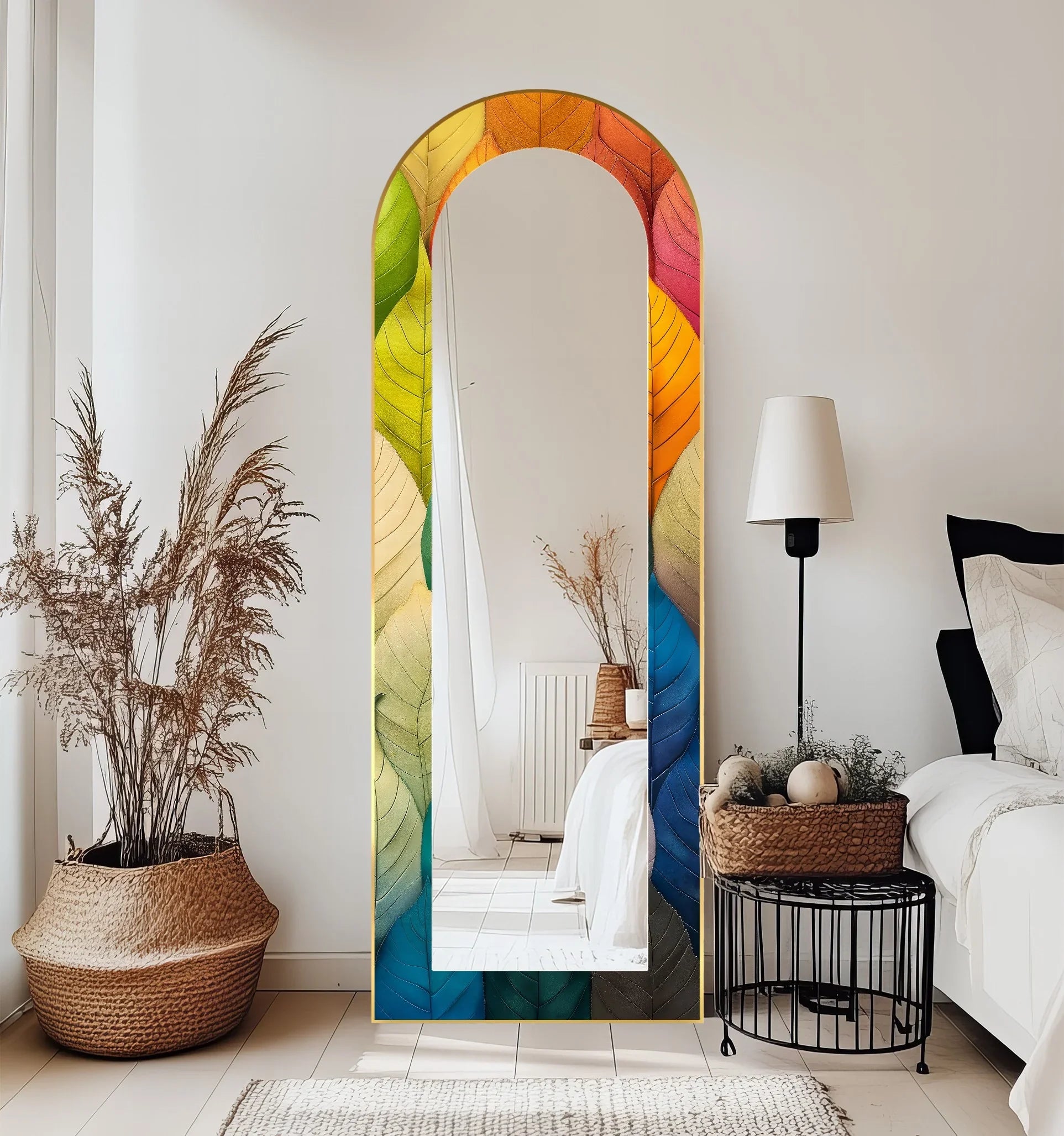 Botanically inspired decorative mirror with an arched, colorful leaf pattern accentuating the artistic edge and gold-toned borders.