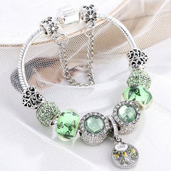 Armband aus Sterlingsilber und grünem Kristall