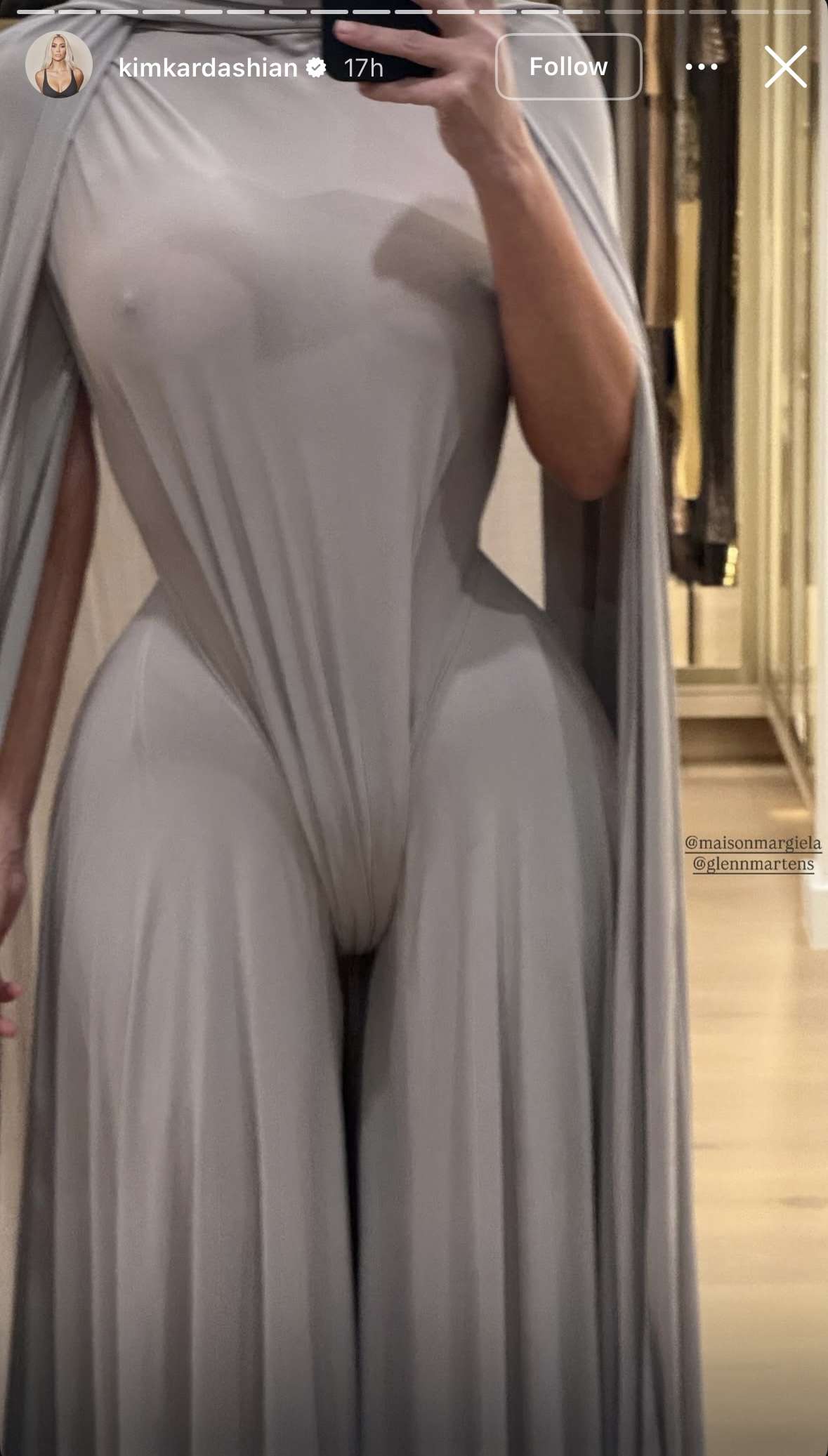 Kim Kardashian Wears Completely Sheer, Nipple-Baring Dress and Cape