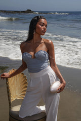Blue Arielle bustier top from JLUXLABEL, featuring a fitted design and off-shoulder style, shown on a model.