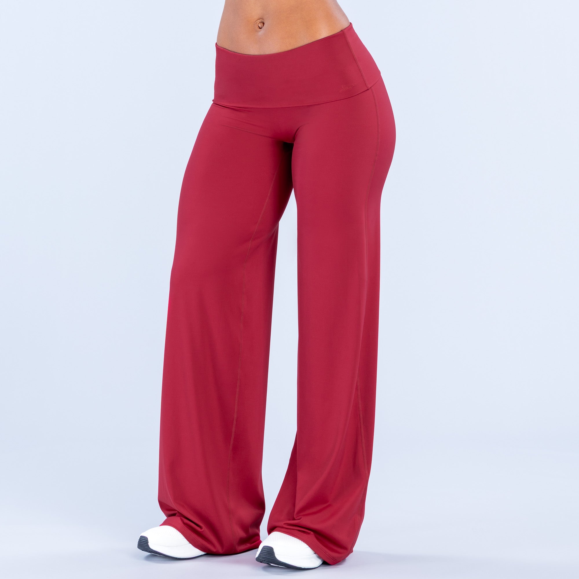 Burgundy foldover wide-leg pants with high waist and straight flowing silhouette