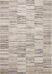 A rug with a charcoal and sand color scheme, featuring a power-loomed precision weave design.