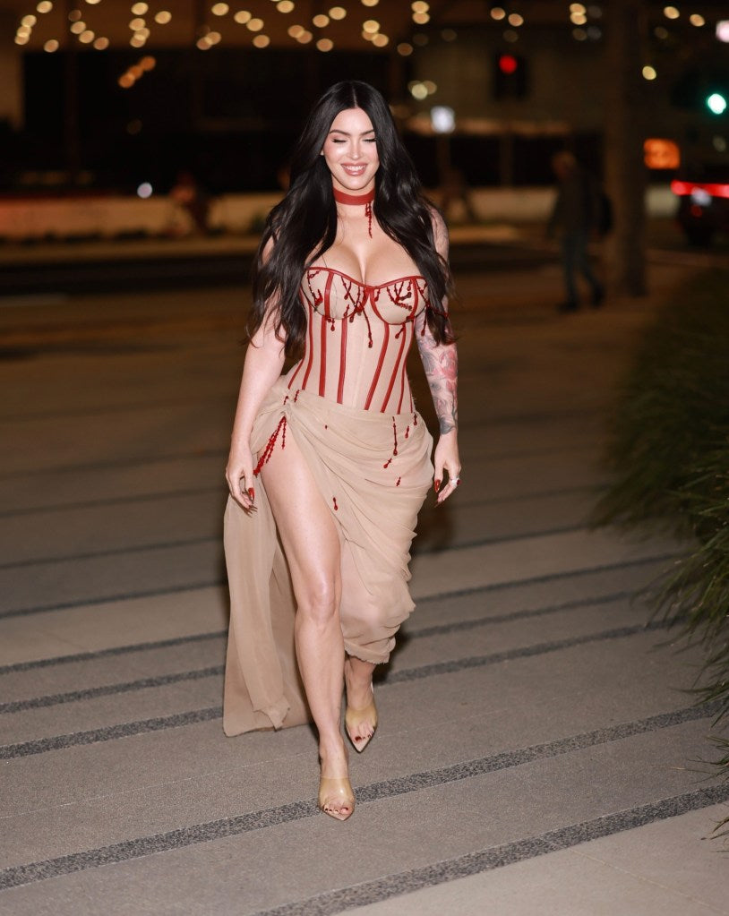 Megan Fox stuns in 'bloody' corset dress 7 months after welcoming baby with  MGK