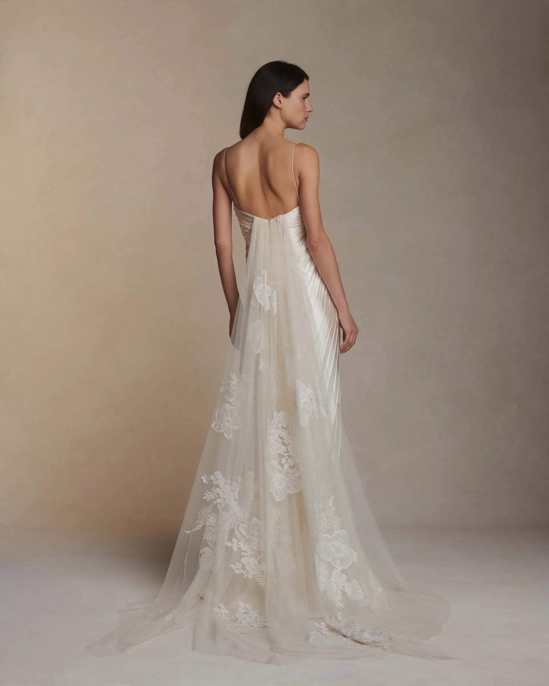 For her 2022 wedding in New Orleans, Alexandra Daddario wore a Danielle Frankel dress in pleated silk wool with hand appliqué lace and a detachable Watteau train. : r/whatthefrockk