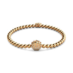 Playa 18k rose gold charm bracelet with crystal-studded sea shell bead and stretch stainless steel base by NOGU