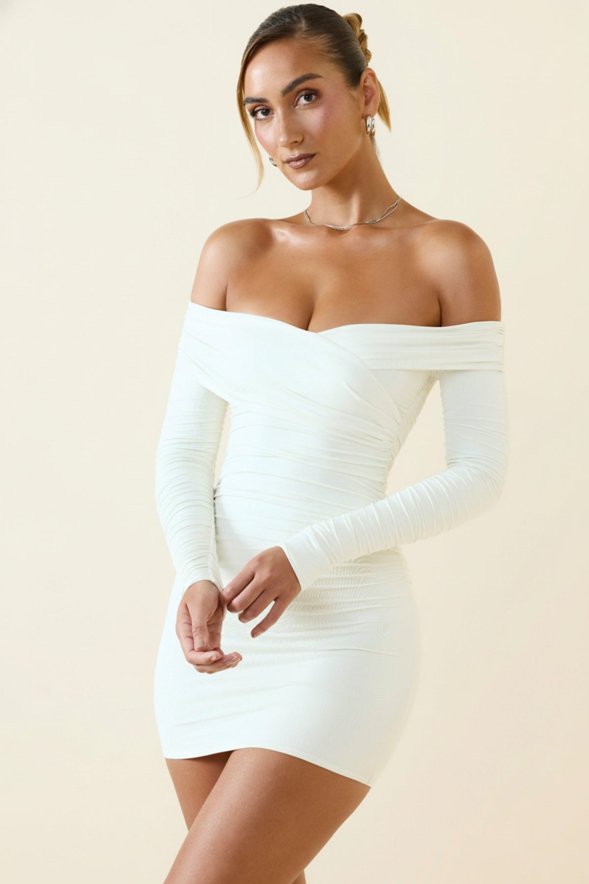 Oh Polly's Priscilla wearing the Aarti Mini Dress in Vanilla Jersey fabric perfect for cocktail hour gatherings