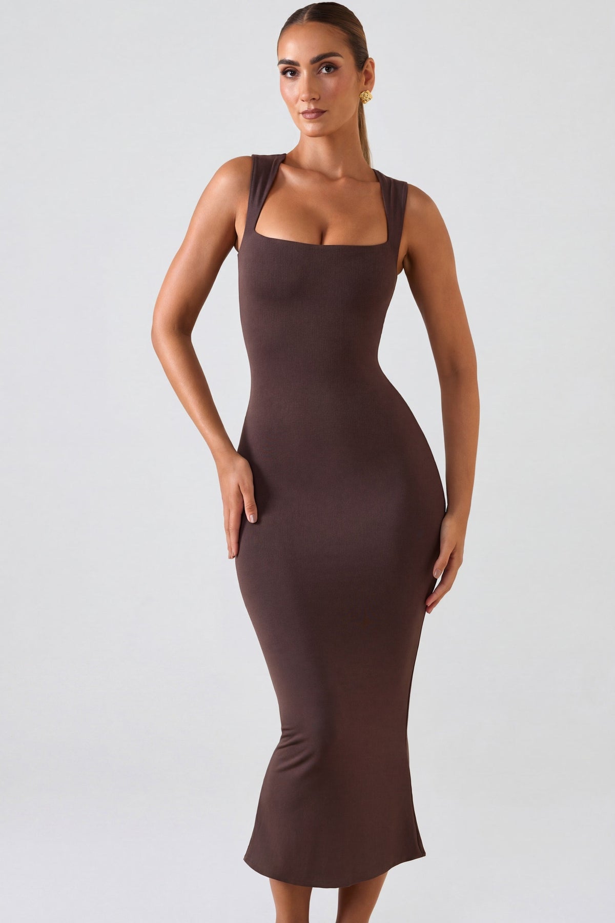 Oh Polly's Priscilla wearing the Ainslee Midaxi Dress in Chocolate Brown Modal fabric perfect for a romantic dinner date