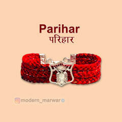 SINGH Parihar logo rakhi bracelet in red with a decorative woven design and central emblem