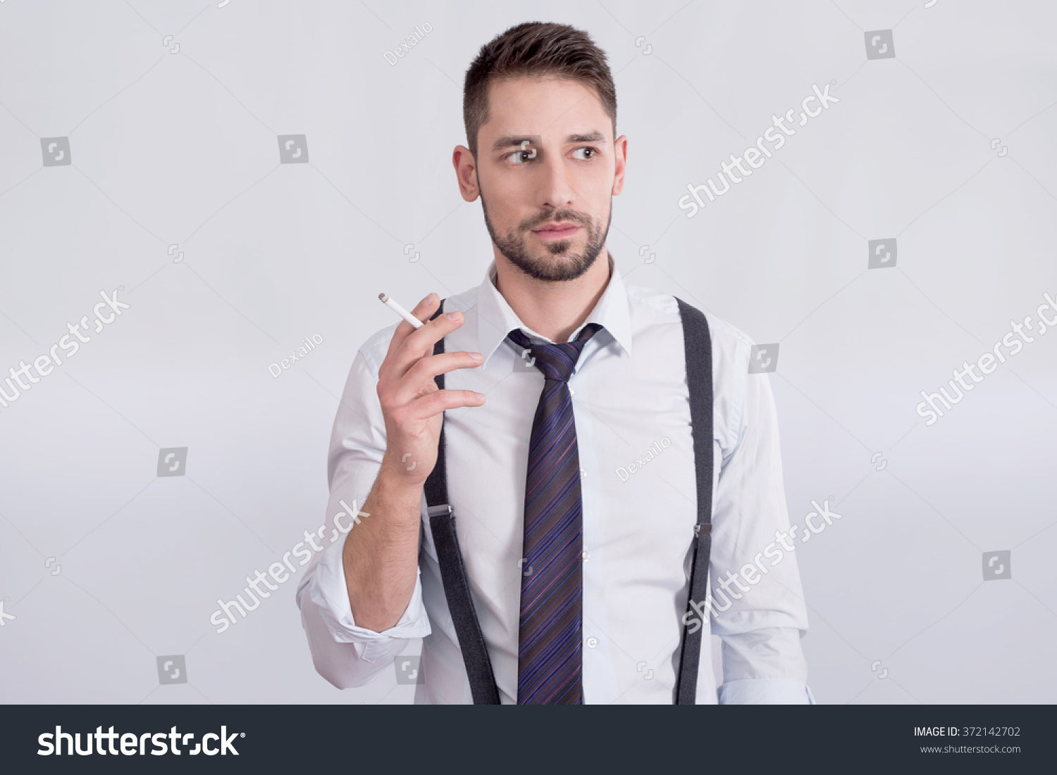 Man Suspenders Holding Cigarette Stock Photo 372142702